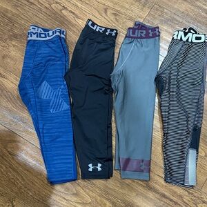 Four pairs of Under Armour Kids' Leggings - Blue, Black, Gray, Striped